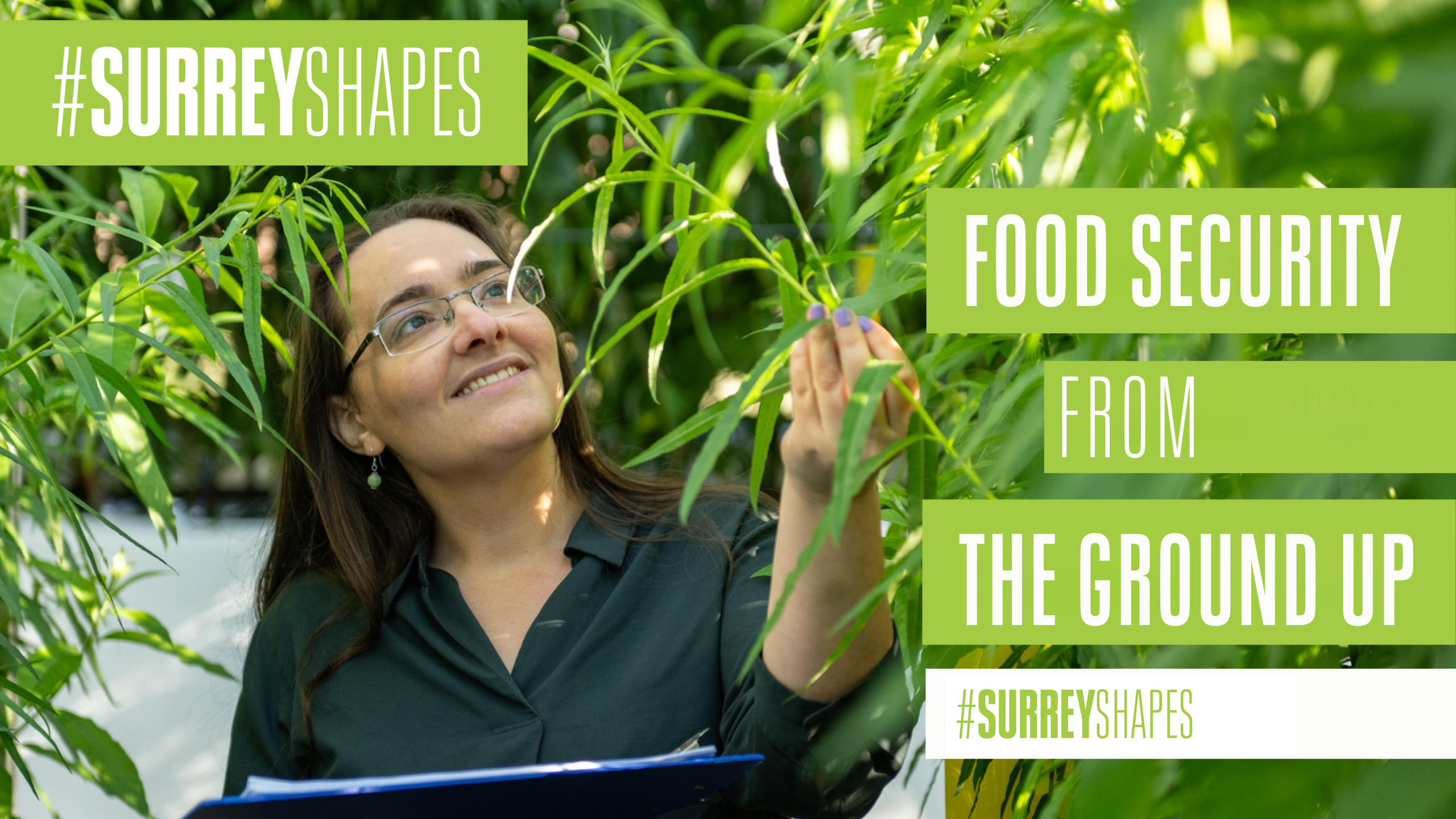 Dr Zoe M Harris holding a leaf