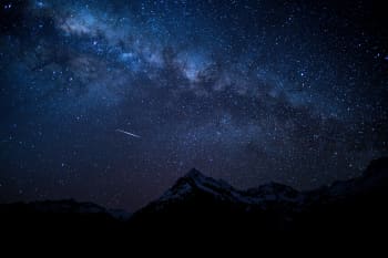 silhouette of mountain peak at nighttime