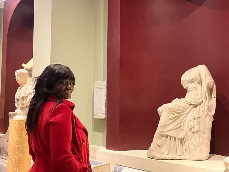 Precious Ibe in a museum