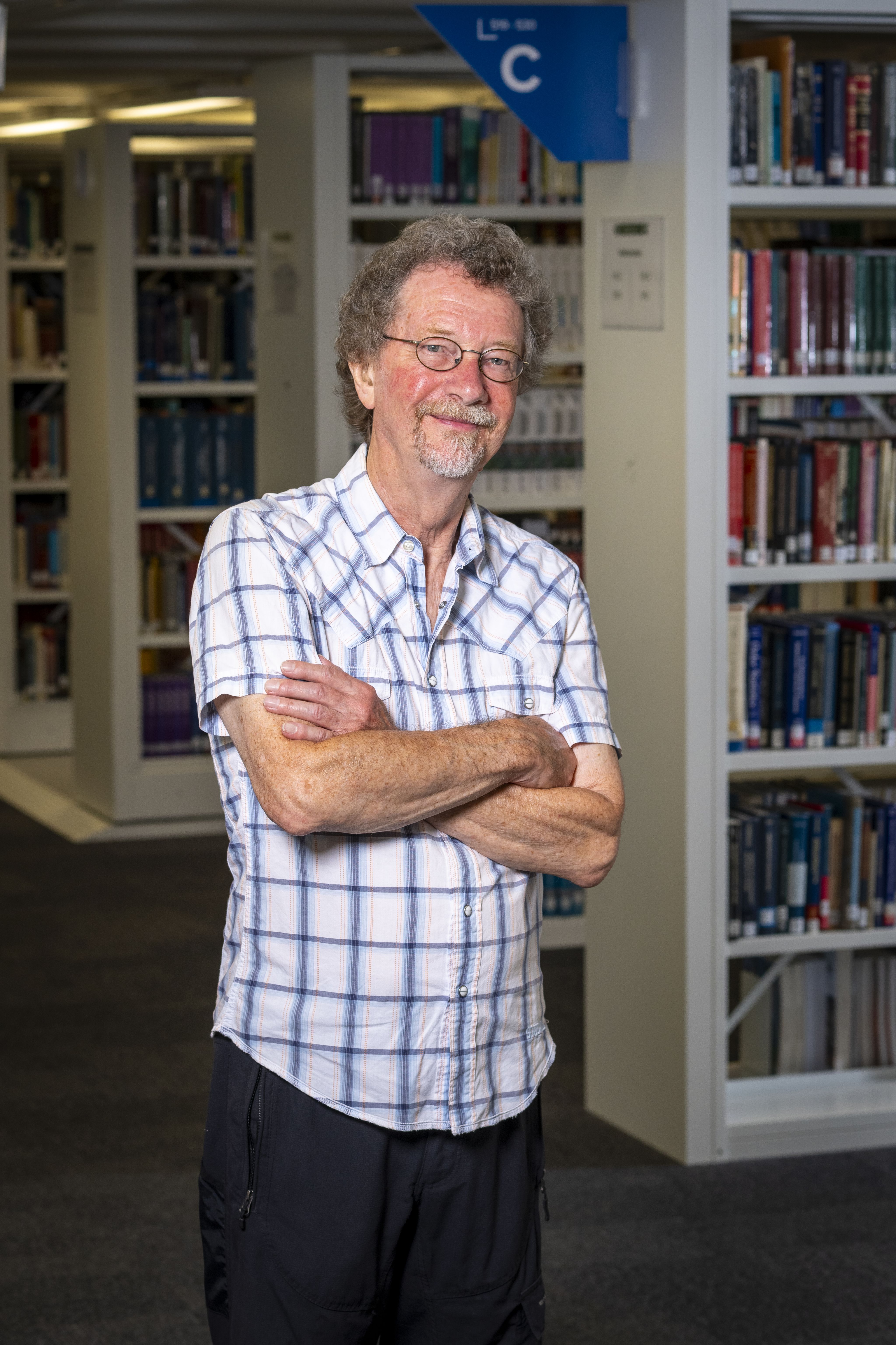 Martyn Sandford in the library at Surrey