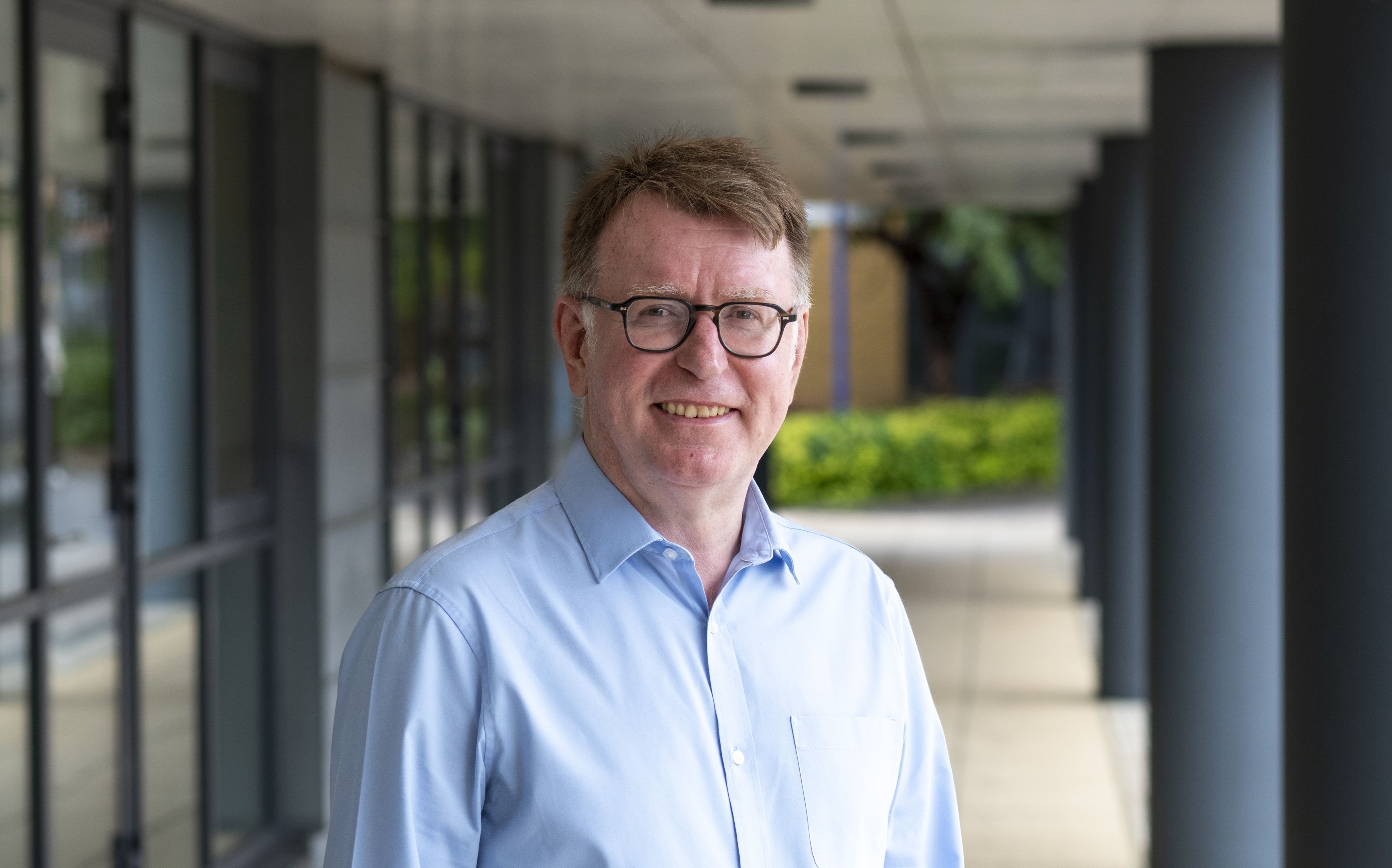 Bob Nichol outside Rik Medlik building on Stag Hill campus
