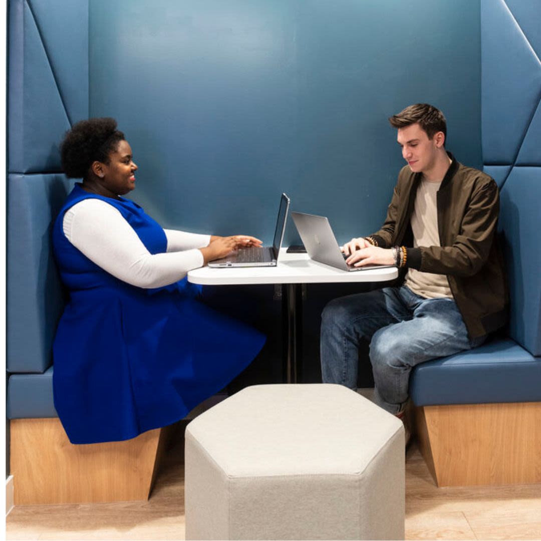 Two students chat in MySurrey Hive