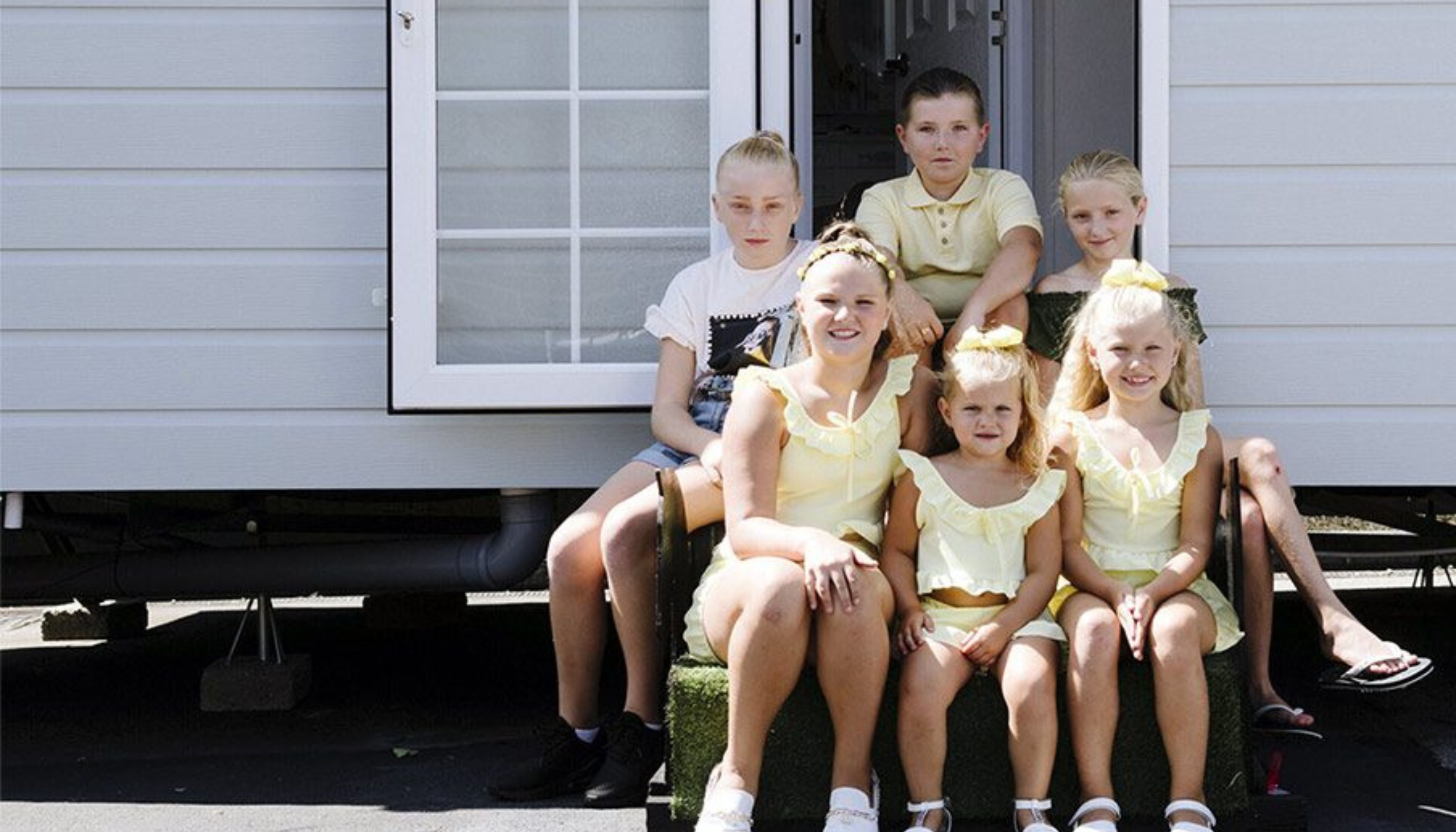Two young boys with a dog