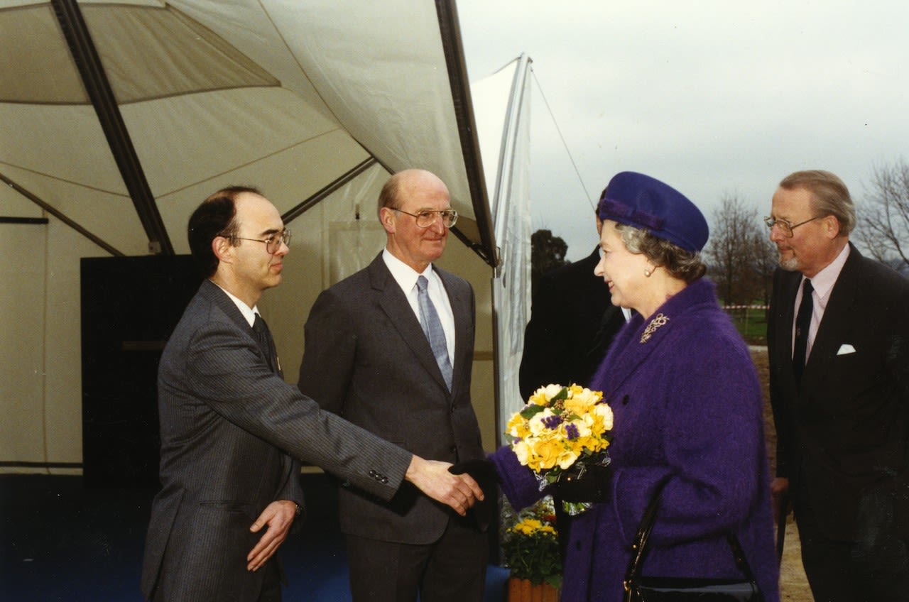 A young Professor Sir Martin Sweeting welcomes HM The Queen. 