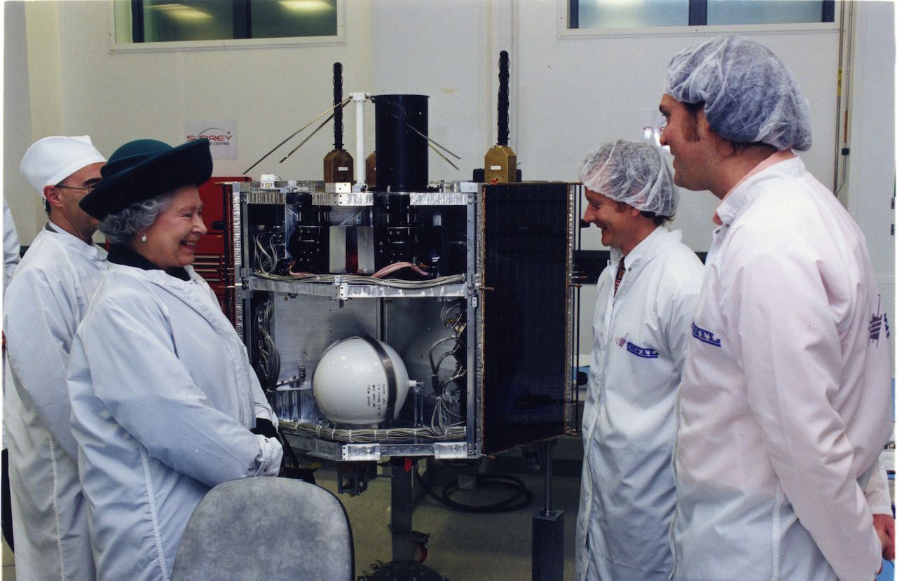 HM Queen Elizabeth II in the Clean Room at the Surrey Space Centre.
