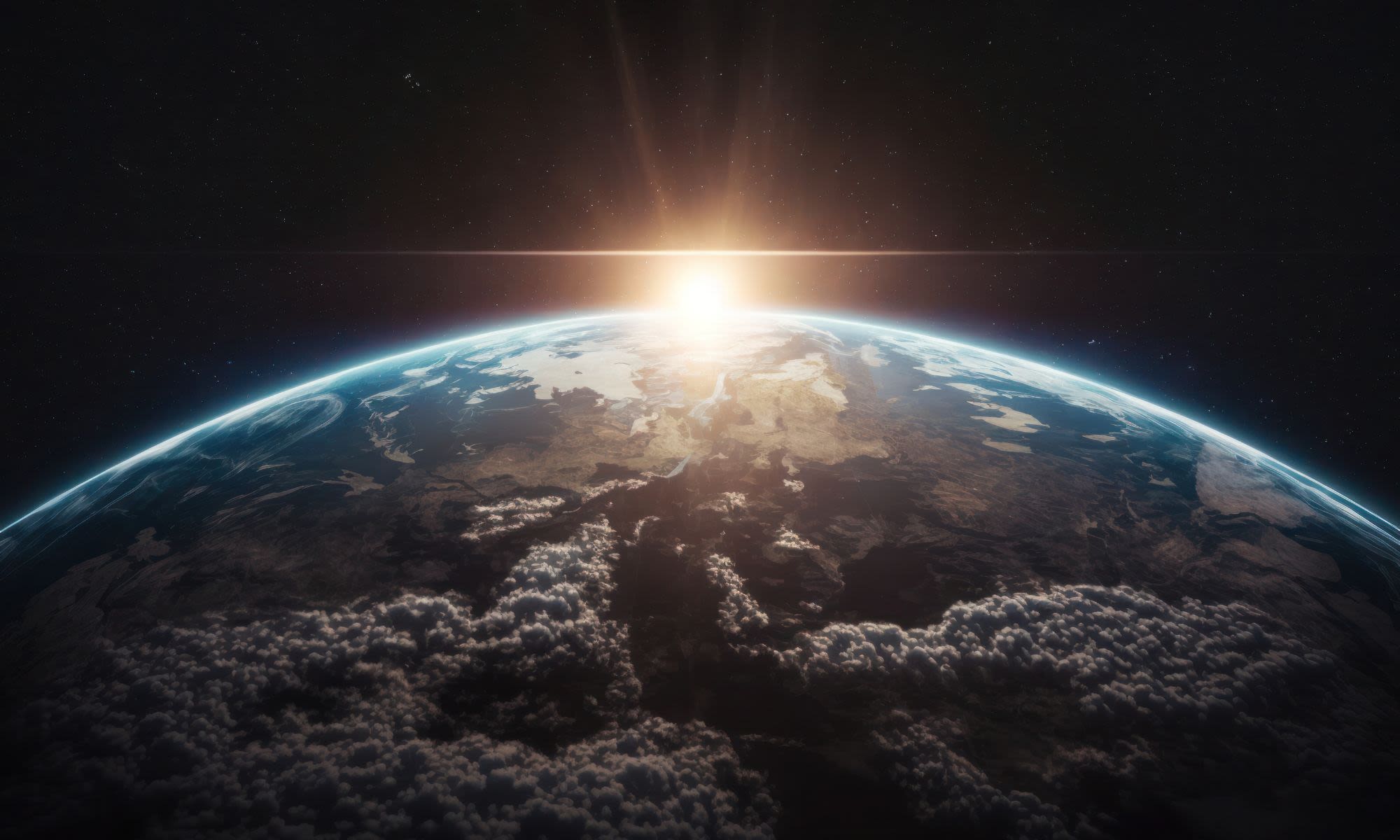 The sun rises behind planet Eart