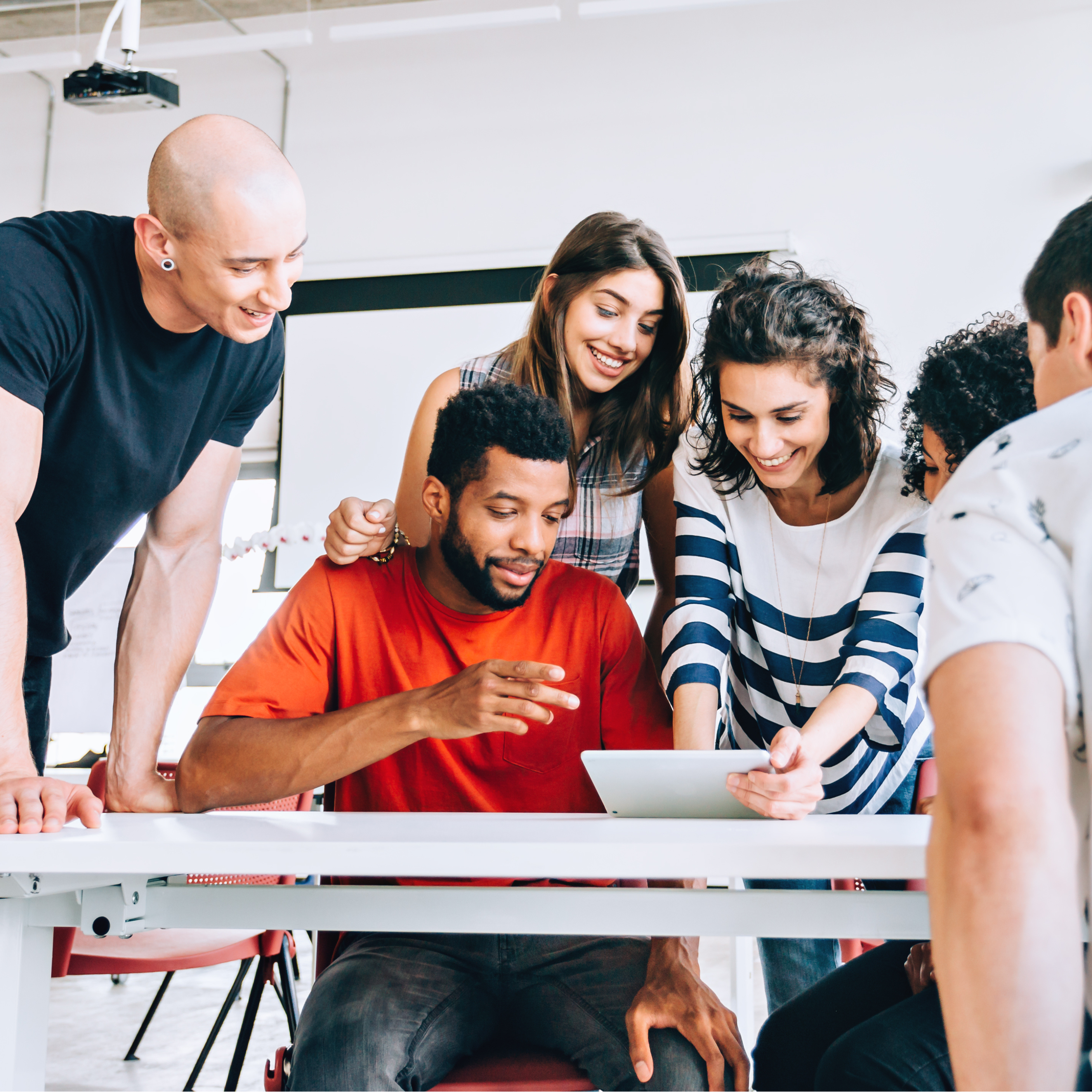 Group of students working around a table