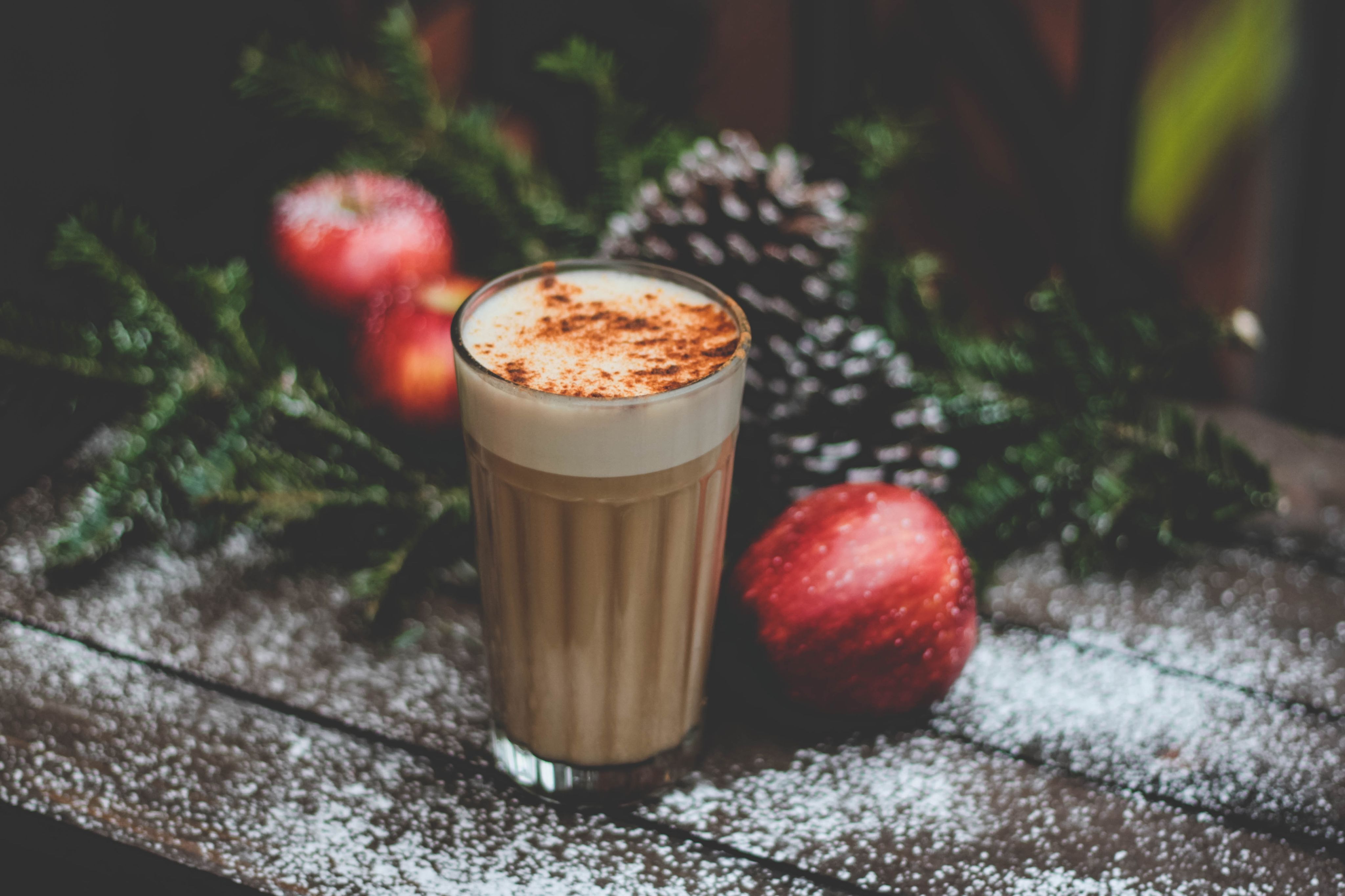 latte surrounded by festive decorations
