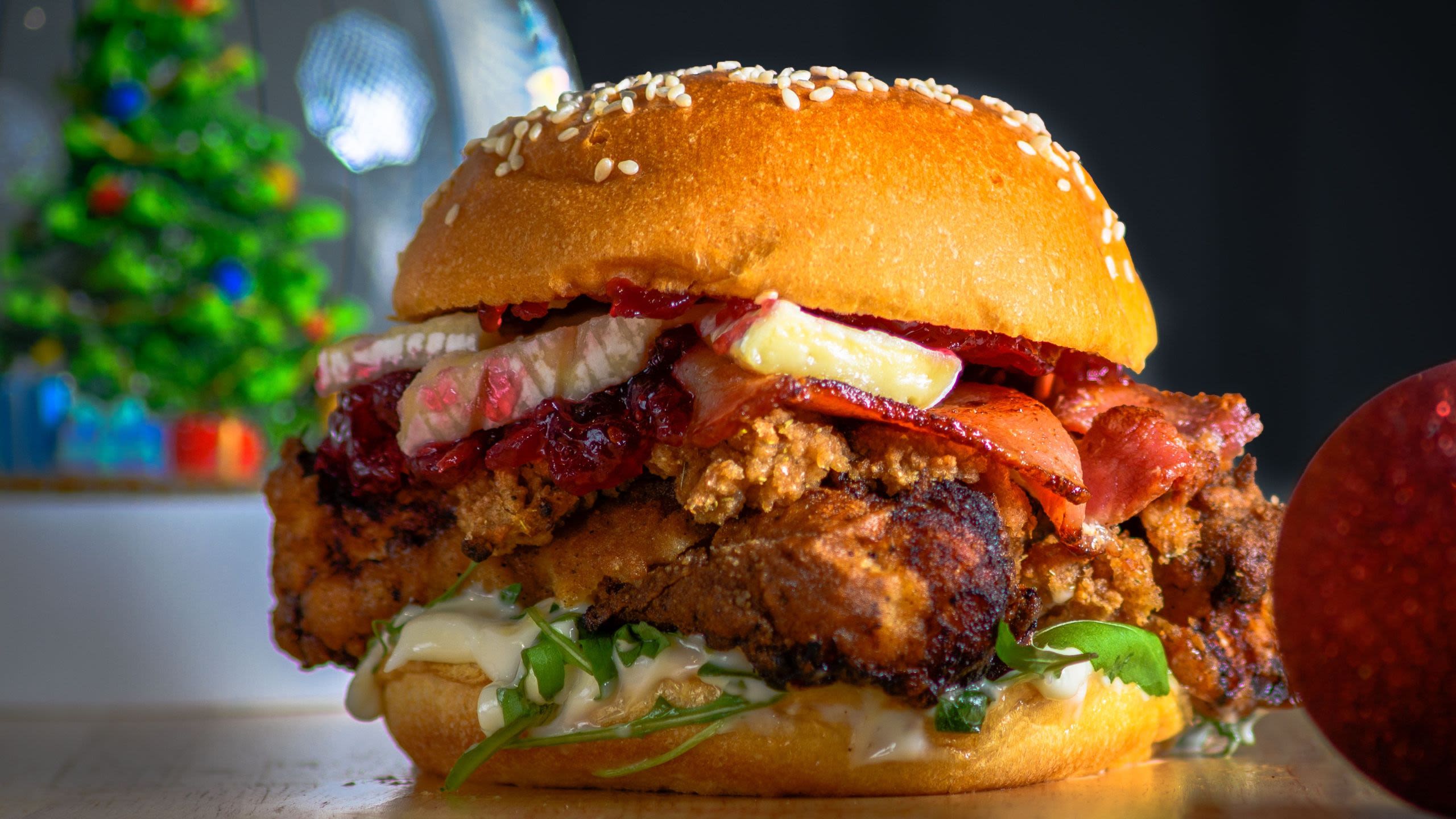 Festive burger with buttermilk chicken and cranberry sauce